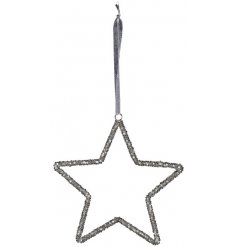 A festive themed hanging glittery star covered with silver beads and hung by a velvet grey string 