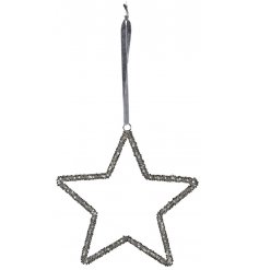 A festive themed hanging glittery star covered with silver beads and hung by a velvet grey string 
