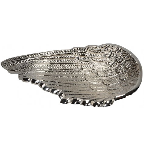 A stylish angel wing shaped trinket dish with detailed, textured feathers. 