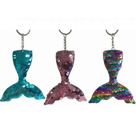 An assortment of funky sequin covered keyrings in a mermaids tail form 