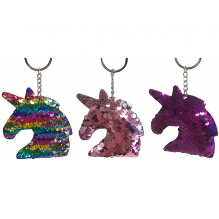 An assortment of funky sequin covered keyrings in a unicorn head form 