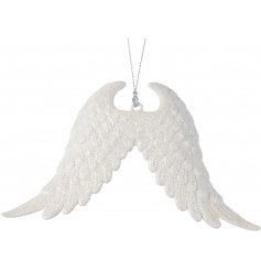 A shimmering pair of angel wings in a warm winter white hue. A stunning decoration and gift item.