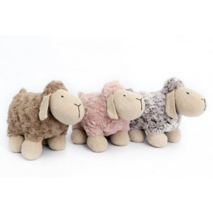  A farm yard mix of woollen sheep doorstops in assorted colours, 