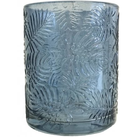  A small decorative glass pot featuring a embossed leaf decal and coastal blue tone 