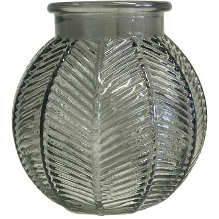 A small decorative glass bowl featuring a bubble shape and ridged decal 