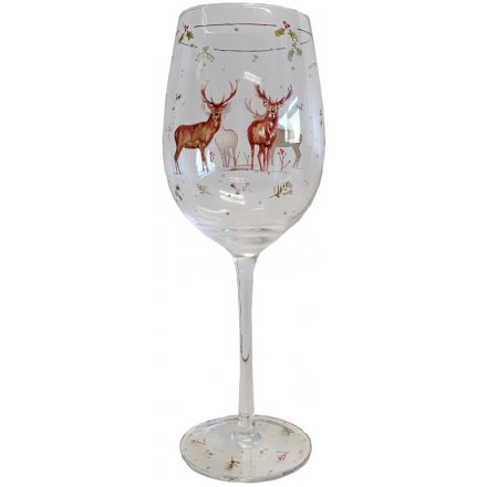 this elegantly decorated Wine glass will be sure to add a festive winter touch to any toast 