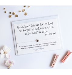 this thin threaded bracelet with an added silver star charm will be sure to make any friend smile 