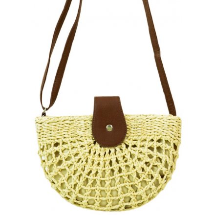 A woven inspired Raffia bag featuring an adjustable faux leather shoulder strap and clip over accent 