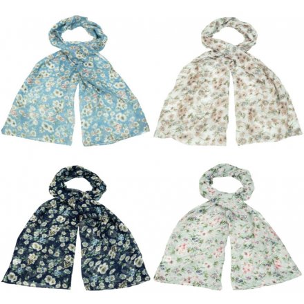 A beautiful mix of coloured scarves each decorated with a floral print and added glitter sparkle 