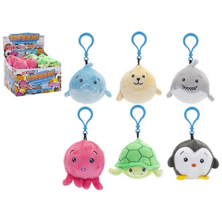  An adorable mix of clip on plush bag accessories in an assorted style 