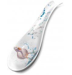 Deirdre Duck is splashing in puddles wearing cute polka dot boots. A charming country image on a practical spoon rest.