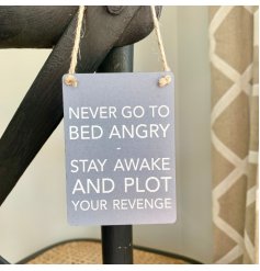A hanging mini metal sign with a neutral grey base colour and block text decal 