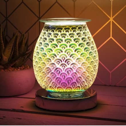 A stunning and unique curved glass lamp with oil burner/wax melt feature with dish, creating a 3-dimensional image.