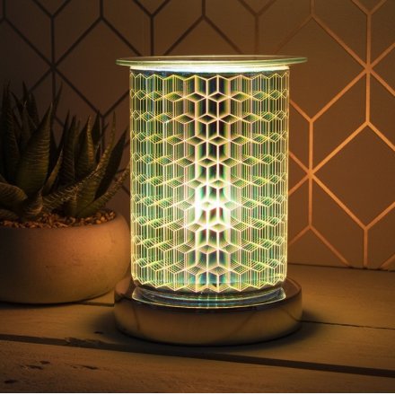 A unique and beautiful lamp with oil burner/wax melt feature. The lamp creates an attractive, geometric starburst effect