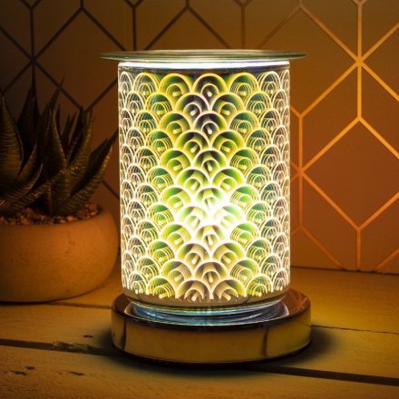 A unique and beautiful lamp with oil burner/wax melt feature. The lamp creates an attractive, 3D colour effect 
