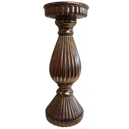   Bring a distressed golden edge to any interior with this sleek and stylish pillar candle holder 