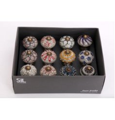  Add a vintage charm to any up-cycled furniture unit with this assortment of colourfully patterned doorknobs 