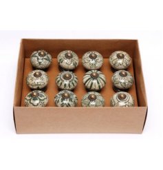 Add a vintager charm to any up-cycled furniture unit with this assortment of green and cream toned doorknobs 