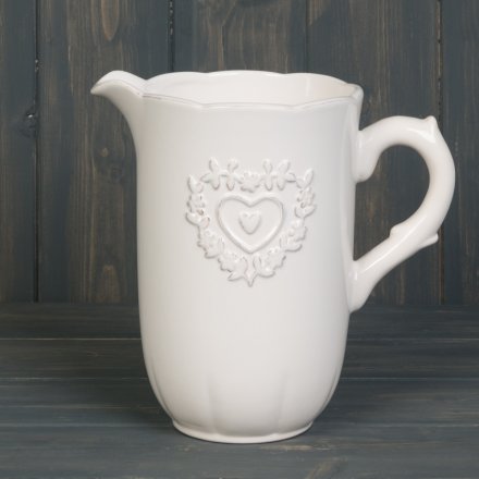 Set with a smooth white ceramic glazing and added ridge heart decal 