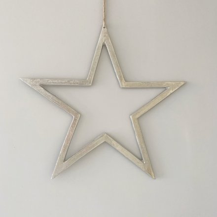 A large silver star decoration with a textured nickel finish and a long black ribbon hanger.