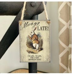 A vintage mini metal sign with a popular Alice in Wonderland illustration and quote.