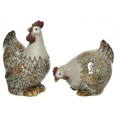 An assortment of 2 rustic rooster decorations. Each is wonderfully coloured with a shiny glazed finish.