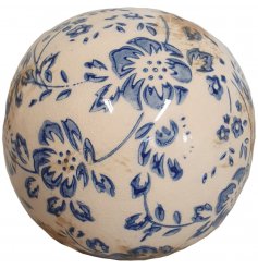 A shabby chic decorative sphere with a beautiful blue floral design inspired by French country interiors.