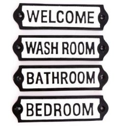 A mix of Cast Iron Plaques, each set with its own bold text decal 