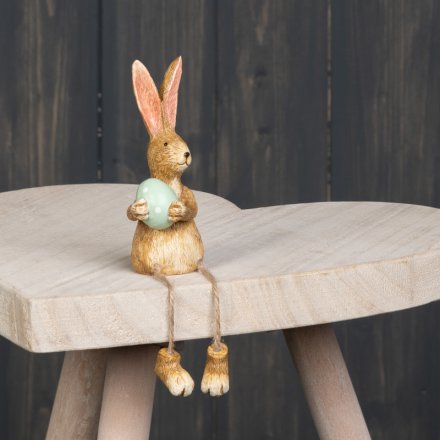 this cute resin bunny decoration will be sure to add a spring touch to any home! 