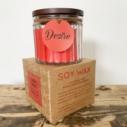  A traditional Cinnamon scented soy wax candle, set within a ridged glass pot 