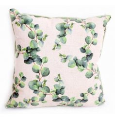Neutral coloured cushion with green Eucalyptus leaf print motif. Approx 40 cm 
