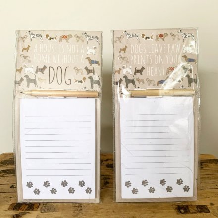Magnetic memo pad with dog pattern embellishment in one of two designs.