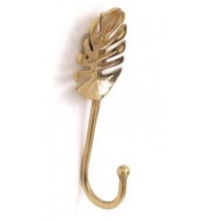 Set with a golden colour, this palm leaf inspired wall hook will be sure to bring a Luxe inspired touch to any interior 