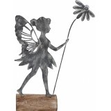 A rustic metal fairy decoration set upon a wooden base. 