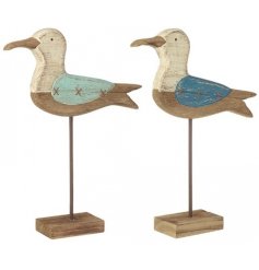A mix of 2 rustic wooden seagulls with a distressed painted finish and charming hand crafted aesthetic.