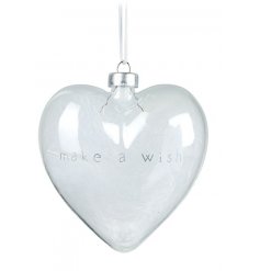  A small and delicate glass heart bauble set with a silver scripted decal and filled with white fluffy feathers 