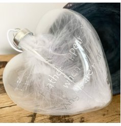 this glass heart with a feather filled centre and silver scripted text decal is a must 
