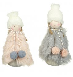 A sweet anf festive mix of standing angel ornaments complete with faux fur coats and fuzzy hats 