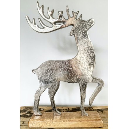Contemporary reindeer ornament - aluminium on a wooden base, medium size is approx 38 cm tall