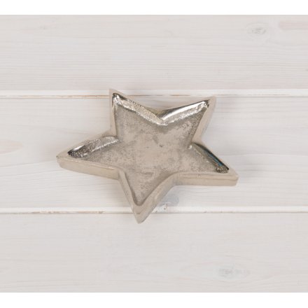 A chic, medium sized, silver star dish with a hammered finish. Ideal for storing small items.