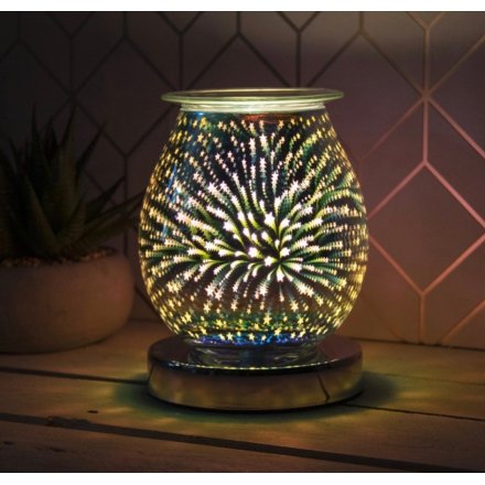 Goblet-shaped lamp with starburst design and built in oil burner. Measures approx 12 x 17 cm