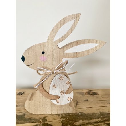 Charming wooden Easter Bunny ornament, embellished with two tone string bow around the neck. Measures approx 18 cm tall.