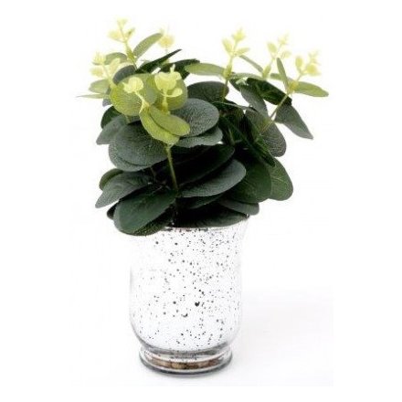 A charming bunch of artificial Eucalyptus Leaves placed within a silver speckled vase 