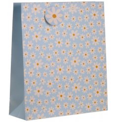 A quirky blue toned gift bag featuring a pretty Daisy decal 