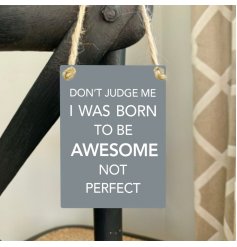 Don't judge me. I was born to be awesome not perfect. A mini metal sign with slogan.