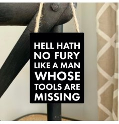 A humorous mini metal sign reading hell hath no fury like a man whose tools are missing.