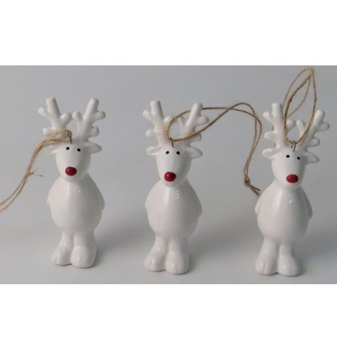 A festive little white ceramic reindeer hanging decoration with a bright red nose 