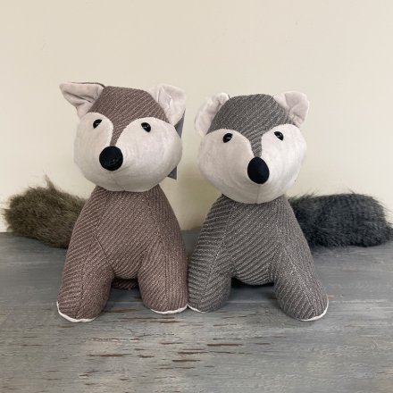   Assorted by their grey and beige tones, these woodland fox doorstops also have faux fur trimmings