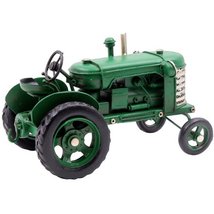 A fine quality vintage tractor model in green tone. A great collectable item by Leonardo.