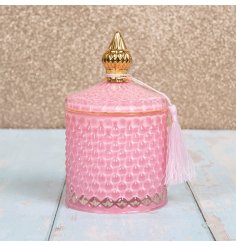   A luxe themed Soy Candle set within a diamond ridge decorated pot with added tassel feature 